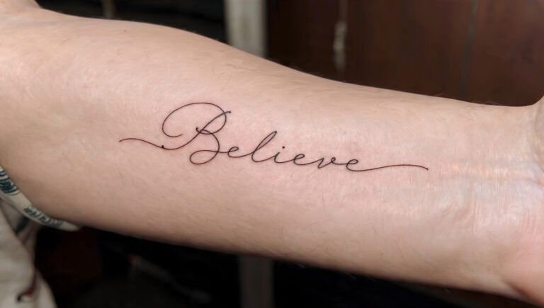 Fine Line Script Motivation Tattoo
