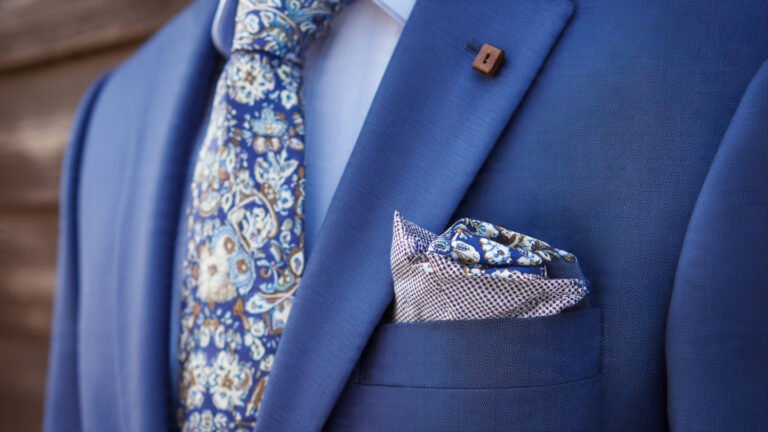 Blue Suit With Patterned Accessories
