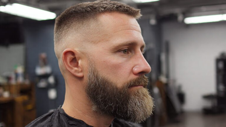 Medium Low Fade With Thick Goatee