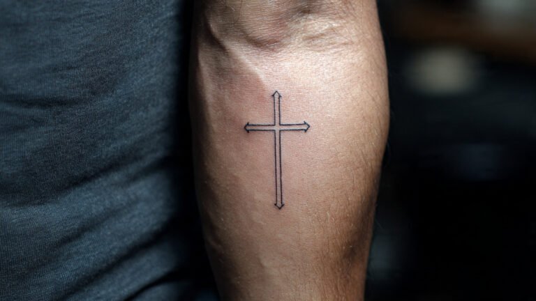 Minimal Cross Line Tattoo