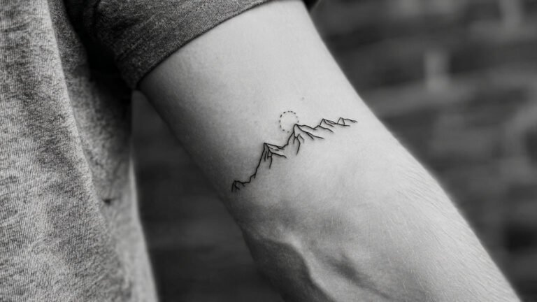 Minimalist Mountain Line Tattoo
