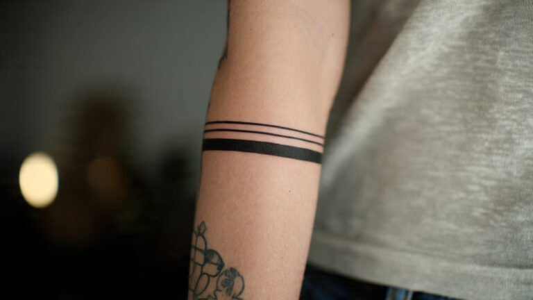 Thin Line Bar Tattoo
