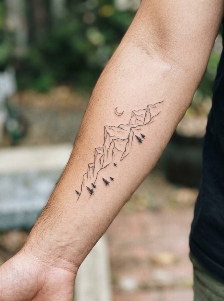 mountain forearm tattoo